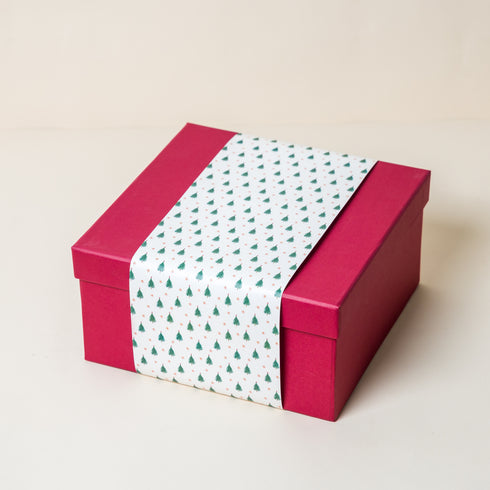 Red Gift Box with Christmas Forest Sleeve