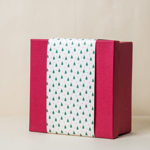 Red Gift Box with Christmas Forest Sleeve