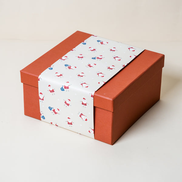 Rust Gift Box with Cream Happy Santa Sleeve