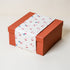 Rust Gift Box with Cream Happy Santa Sleeve