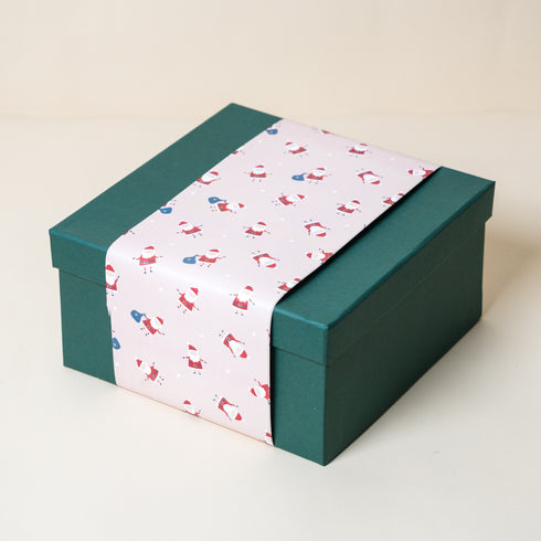 Green Gift Box with Pink Happy Santa Sleeve