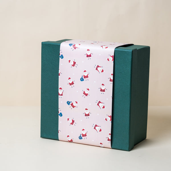 Green Gift Box with Pink Happy Santa Sleeve