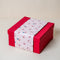 Red Gift Box with Pink Happy Santa Sleeve